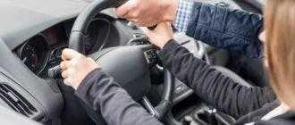 instructor s hand helping drive woman