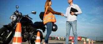 instructor student handshake before start driving classes