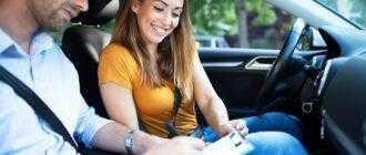 car instructor explaining city traffic rules before driving car