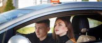 driver is auto school instructor female student examination car