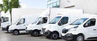 several vans trucks parked parking lot rent